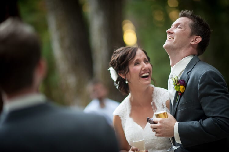 A bride and a groom laughing