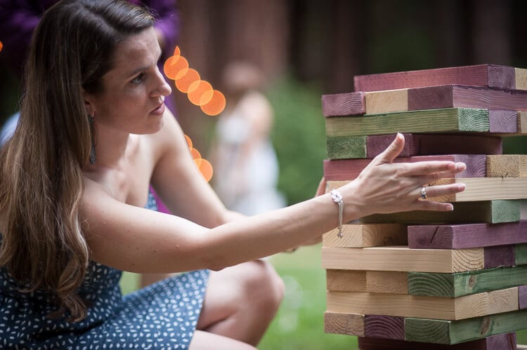 wedding guest playing lawn Jenga