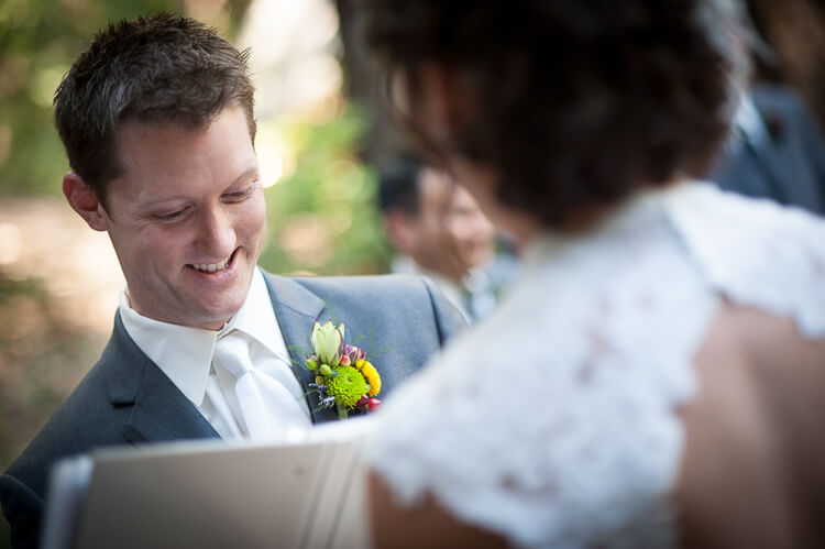 A groom reading from a book