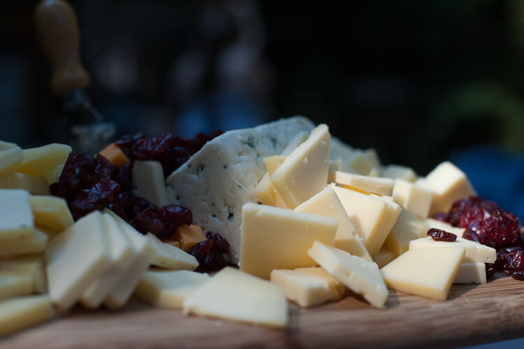 A tray of cut op cheeses