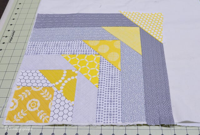 close up of in progress North West Quilt-As-You-Go Panel on cutting mat