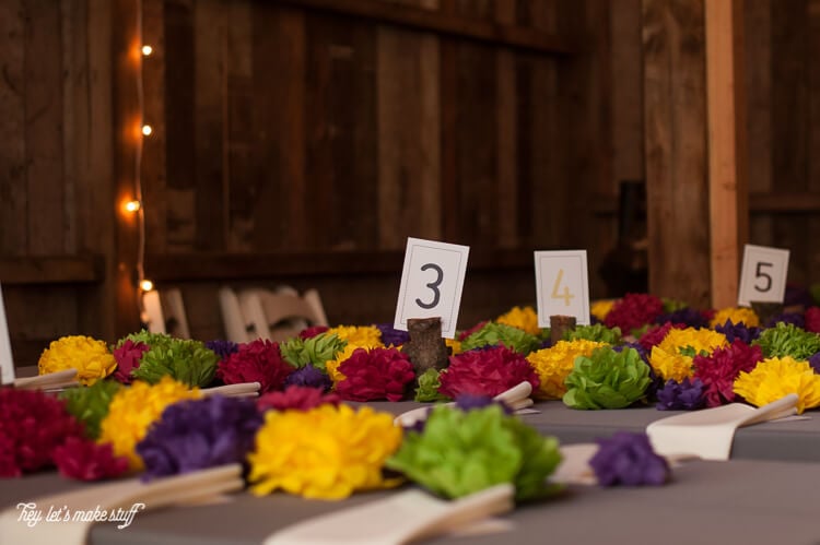 Learn how to make four different types of tissue paper flowers -- they can make a gorgeous wedding centerpiece without breaking the bank!