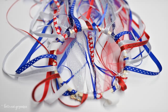 patriotic windsock tutorial - red, white, and blue ribbon attached to embroidery hoop