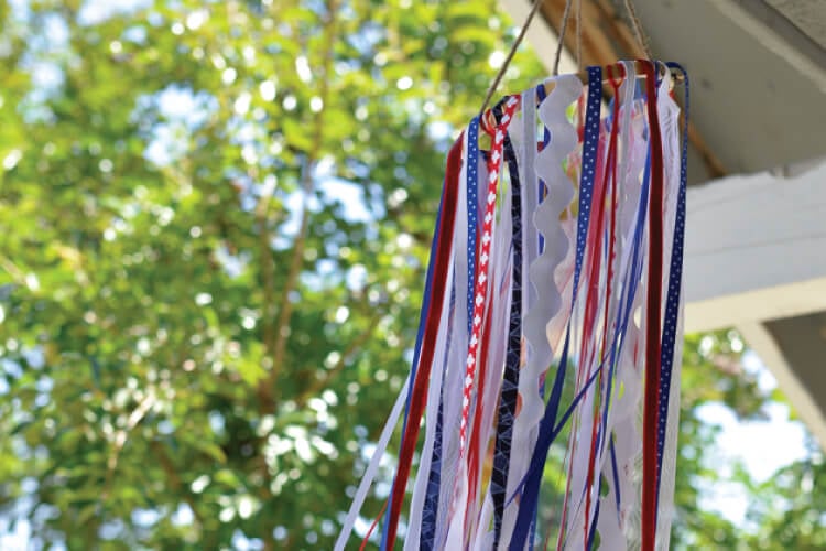 red, white and blue hanging windosck