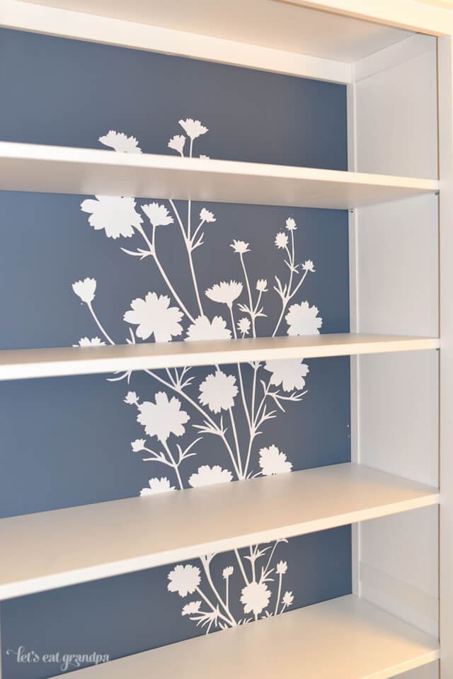 finished bookshelf with floral decal