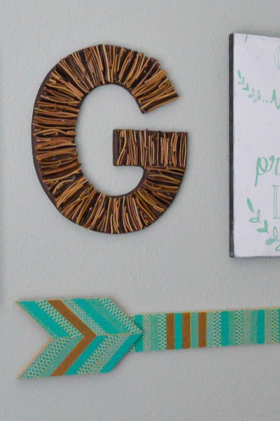 Take a hike and collect some found objects, like sticks and feathers. Then make a personalized initial!