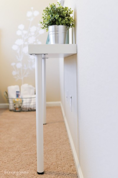 Need a storage table but short on space? You can hack together this IKEA console table for just $22!