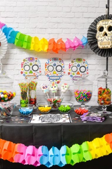 Take Sugar Skulls to a whole new level with this fun Dia de los Muertos Party Candy Bar! Halloween | Party | Candy