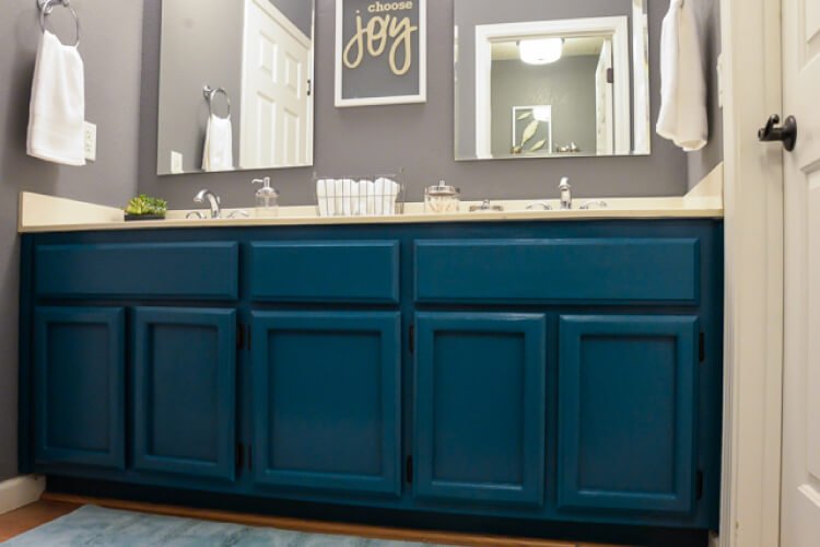 finished painted teal bathroom cabinets