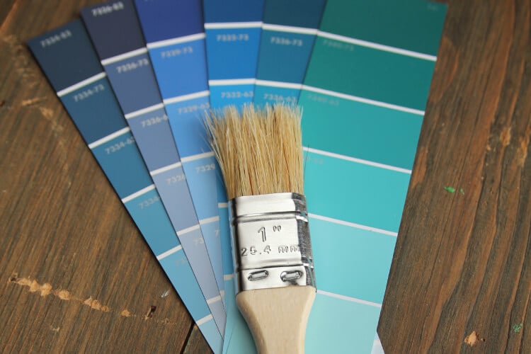 blue paint swatches with paintbrush