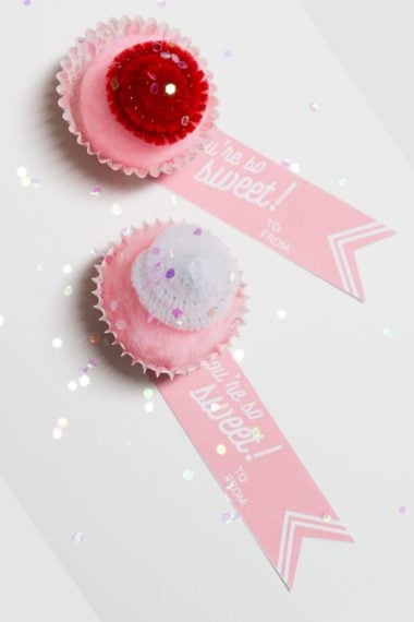 Cupcake valentines are an adorable, calorie-free treat! An easy Valentine's Day craft to hand out to classmates, coworkers, or that special someone.