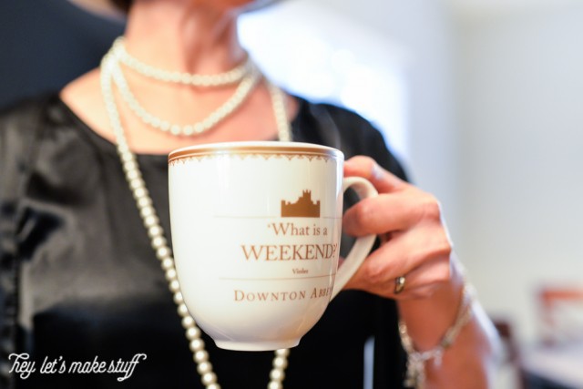 Close up of a woman holding a coffee cup