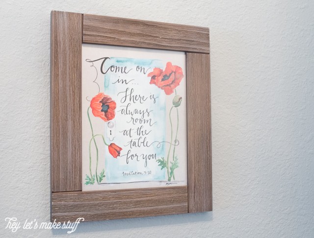 picture frame with wall art hanging from wall