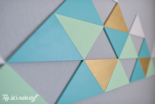 close up of DIY geometric mountains on wall