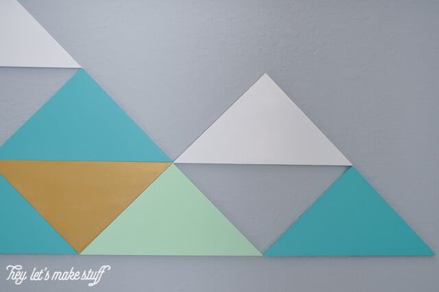 close up of DIY geometric mountains on wall