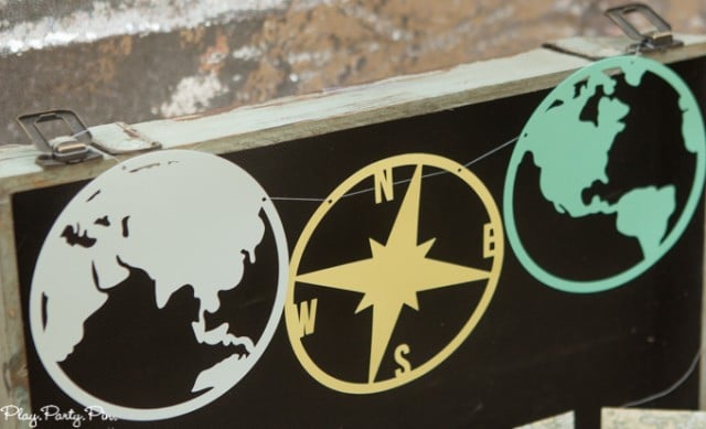 Around the World Pennants cut on a Cricut or Silhouette in globe and compass shapes