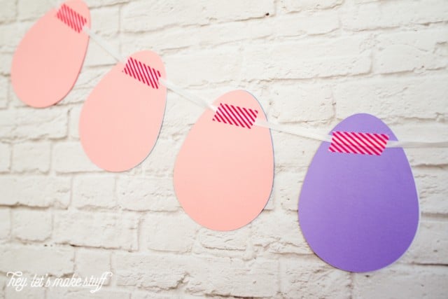 paper egg banner with washi tape to turn them into a banner