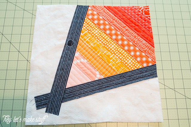 fabric strips for Go Fly a Kite QAYG finished quilt block 