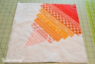 This Go Fly a Kite QAYG quilt block is perfect for a spring quilt! Includes the instructions to make this adorable quilt block.