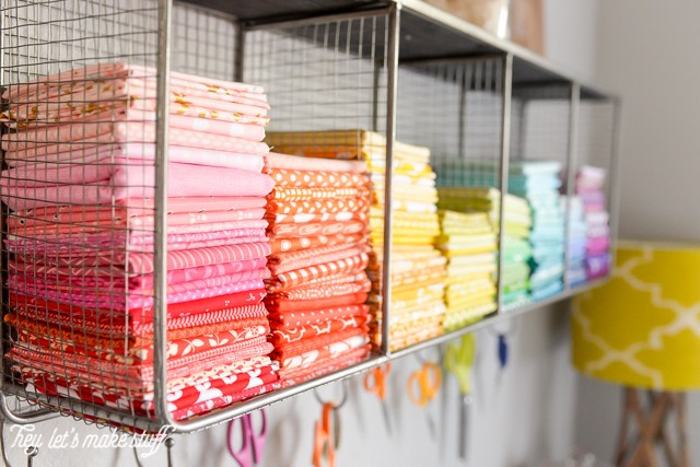 closeup of colorful fabric quarters organized
