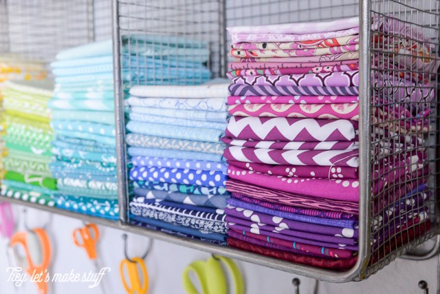 closeup of colorful fabric quarters organized