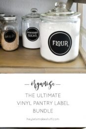 Jars on shelves filled with pantry staples and labeled with their contents with advertising from HEYLETSMAKESTUFF.COM to organize using the ultimate vinyl pantry label
