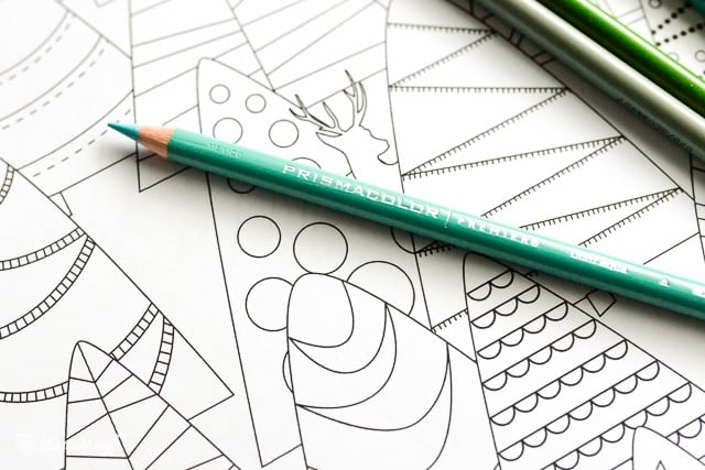 close up of printable coloring wrapping paper with a colored pencil