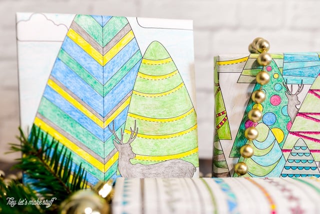 presents wrapped in in printable coloring wrapping paper with colored pencils