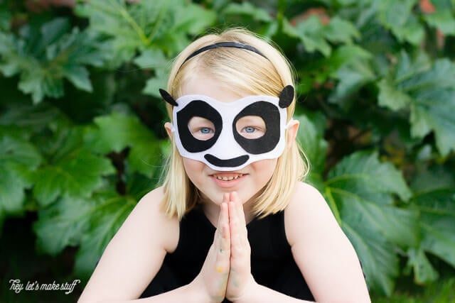 young girl wearing DIY Kung Fu panda mask 