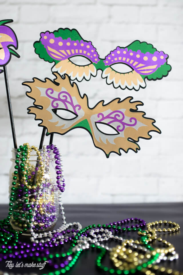 finished cut out colorful Mardi Gras masks made from paper