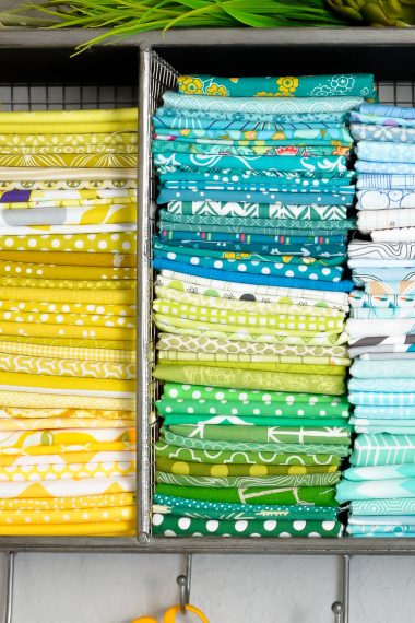 Learn the quick and easy way to fold fat quarters and half yards for easy storing in your sewing space!