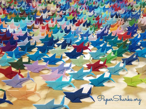 Image of numerous paper shark origami\'s