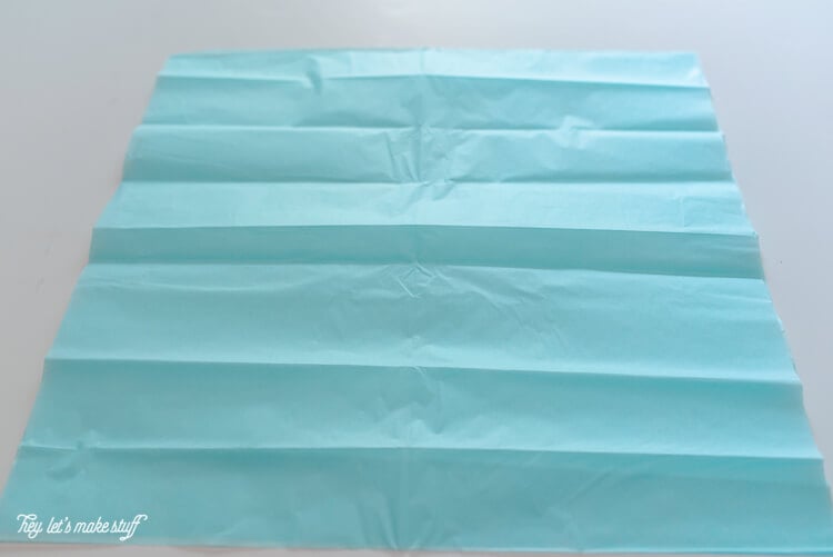 Blue tissue paper folded accordion style