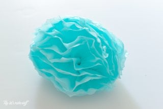 These tissue paper jellyfish are perfect for a mermaid birthday, under the sea party, or any other beachy event you might have!