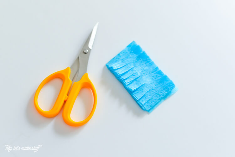 cut crepe paper to make jellyfish