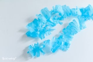 Blue crepe paper with cut fringe