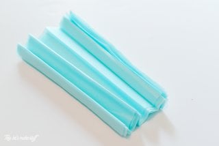 Blue tissue paper folded accordion style