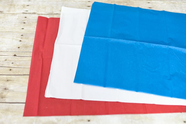 Red, white, and blue tissue paper to make fireworks