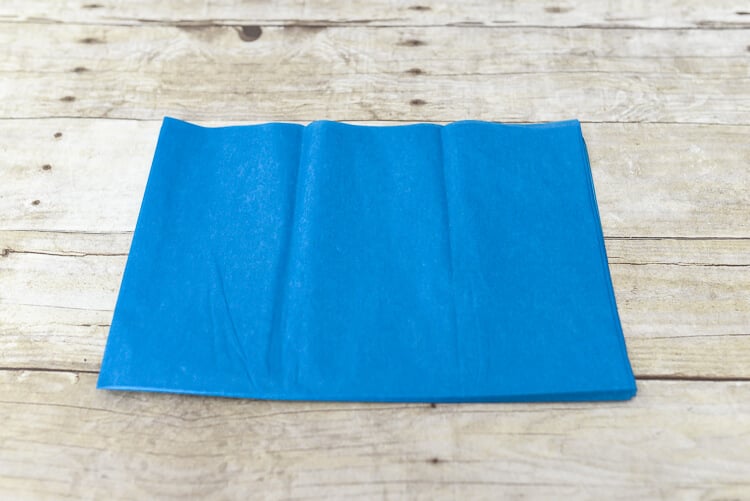 make tissue paper fireworks - fold tissue paper in half again