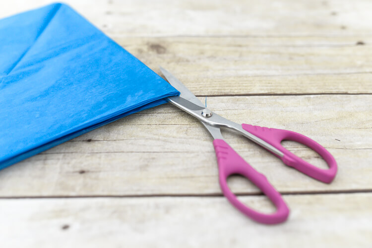 make tissue paper fireworks - cut through the folded edge