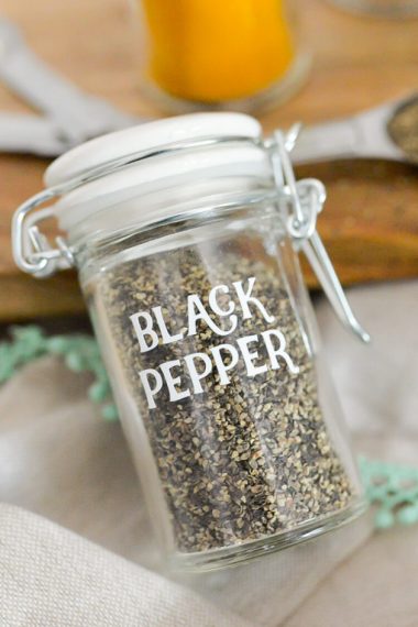 This set of 65 spice jar labels can be cut on a Cricut Explore or other electronic cutting machine -- perfect to organize your spice cabinet!