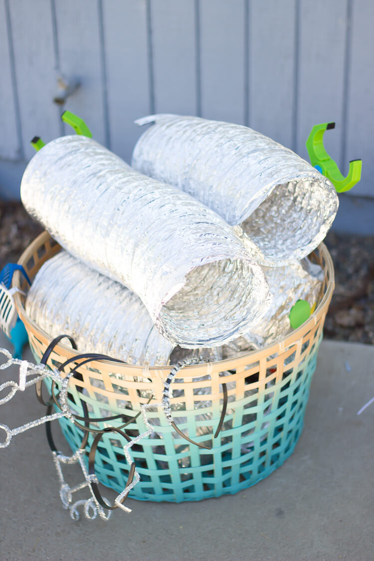 A basket filled with unidentifiable things and robot headbands