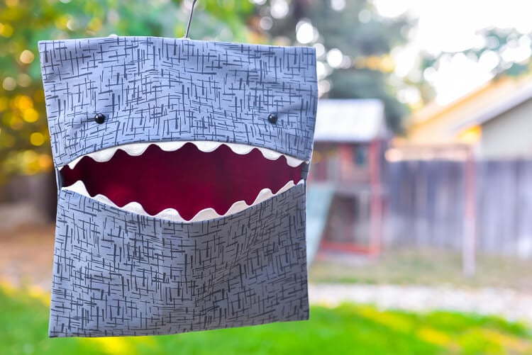 A shark clothespin bag