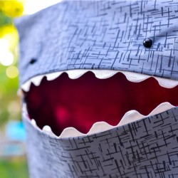 Close up of a shark clothespin bag