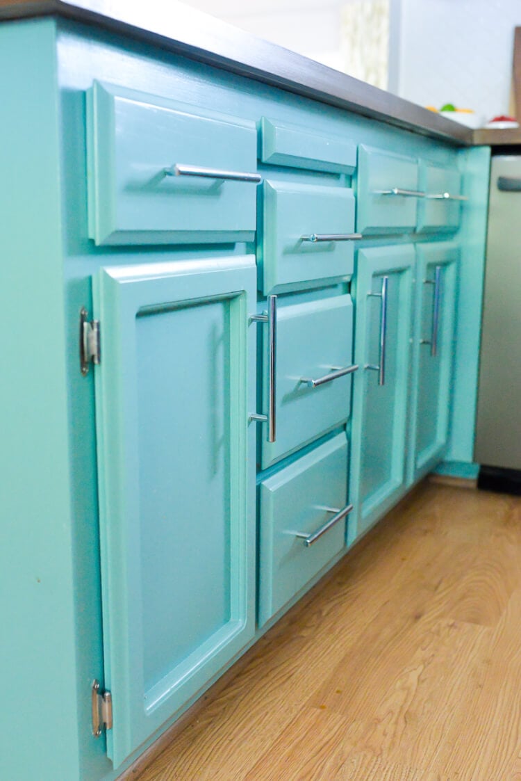 Blue lower cabinets in a kitchen