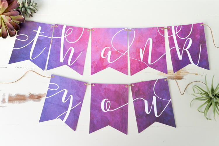 Use the Cricut Explore's Print Then Cut feature to make this beautiful THANK YOU banner for your wedding, in three gorgeous watercolors!