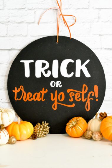 Get the free SVG cut files to make this hilarious Parks & Rec themed Halloween door sign!