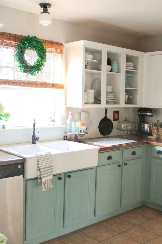 A kitchen with a sink and a window