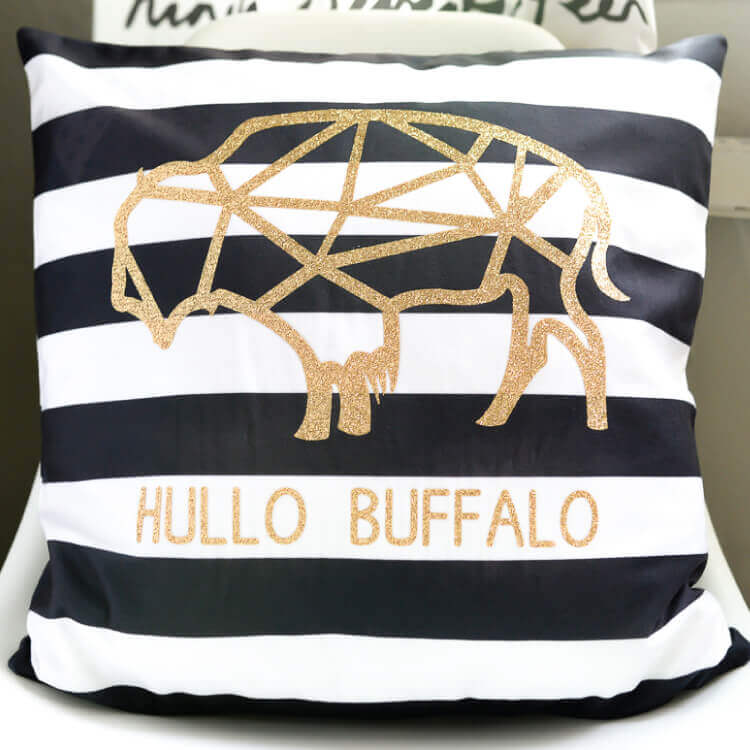 Use your Cricut Explore Air 2 to make this modern buffalo pillow using glitter iron-on vinyl