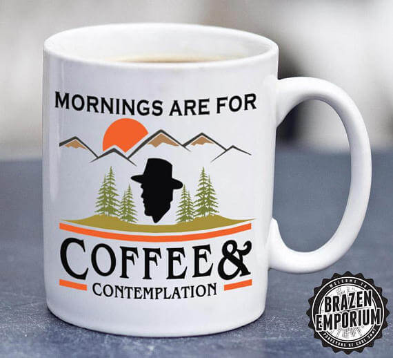 A close up of a coffee mug that says, \"Mornings are for Coffee & Contemplation\"